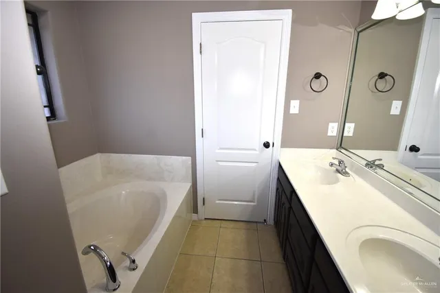 a bathroom with a toilet sink and bathtub