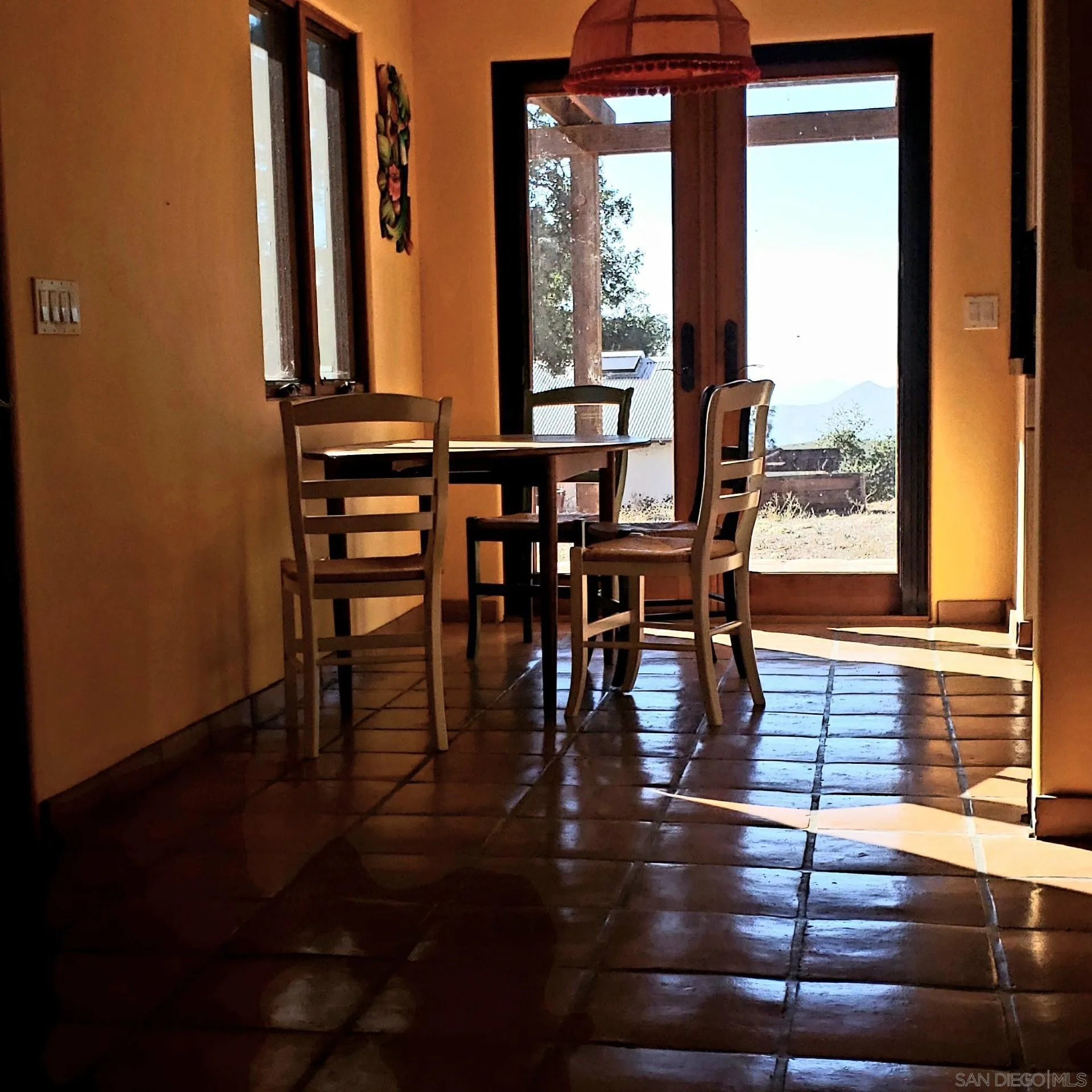 0 Tule Springs Road Julian, CA 92036 - Photo 12 of 44 a view of a dining room with furniture window and wooden floor
