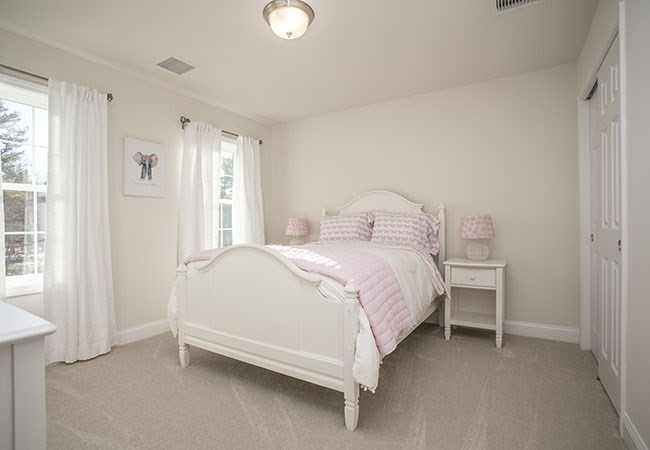 283 Plain Street Rehoboth, MA 02769 - Photo 13 of 13 a bedroom with a bed and a window