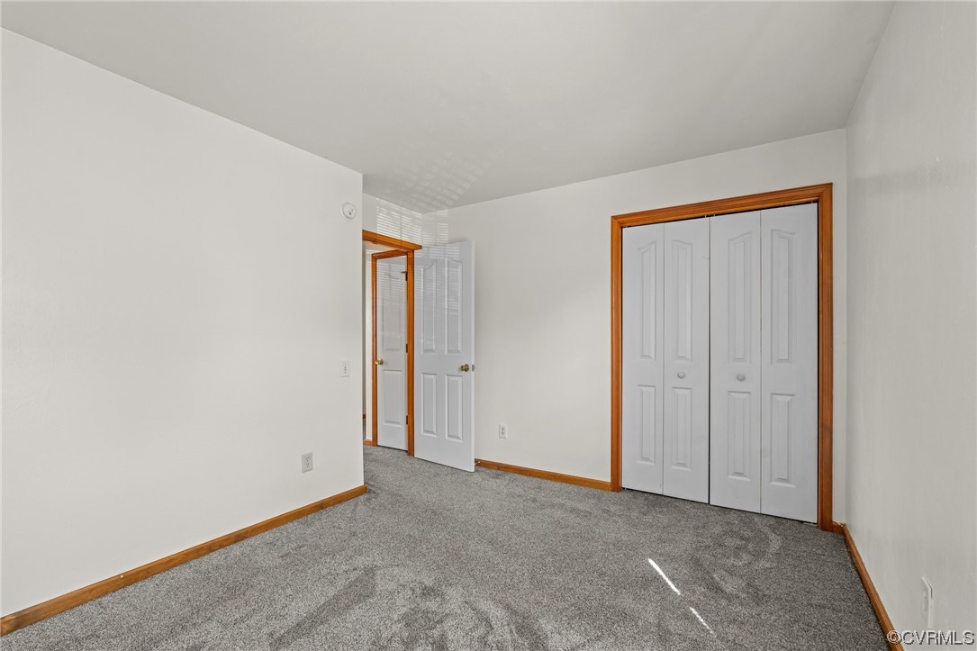 131 Stoney Ridge Avenue, Unit 52 Suffolk, VA 23435 - Photo 19 of 36 a view of an empty room and closet area