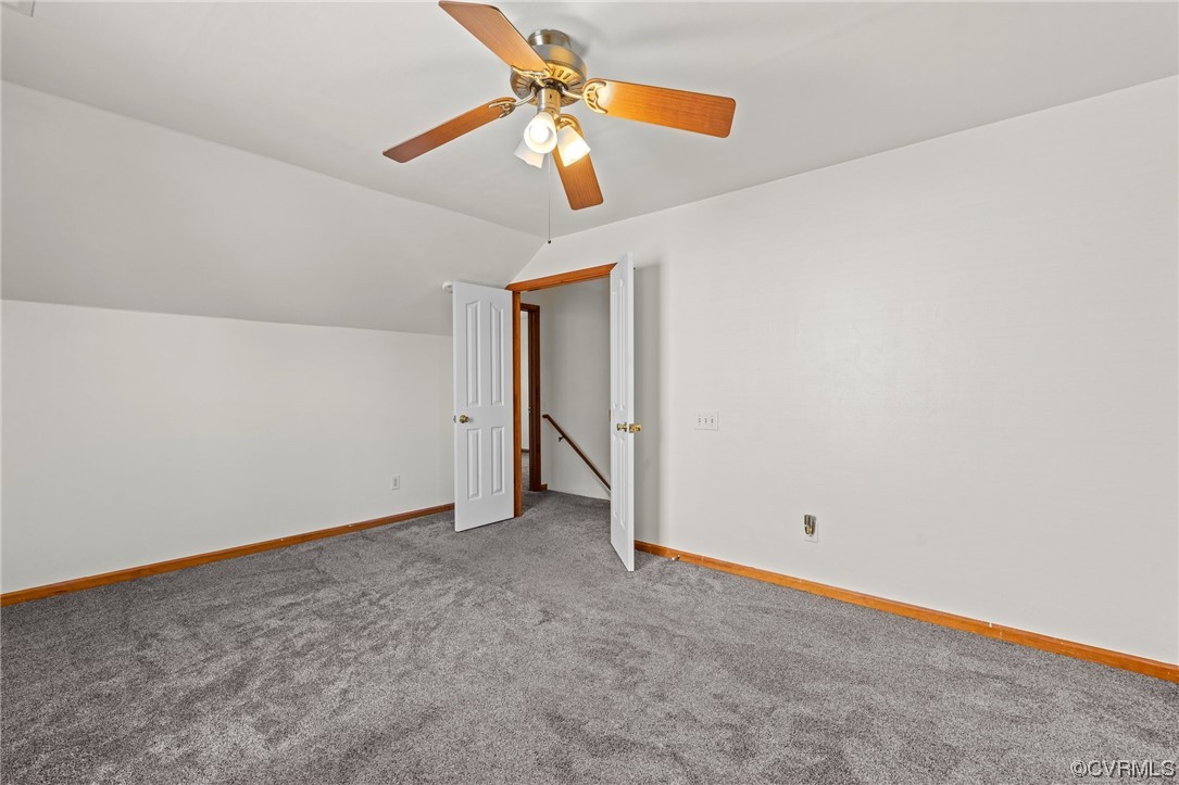131 Stoney Ridge Avenue, Unit 52 Suffolk, VA 23435 - Photo 21 of 36 an empty room with closet and a chandelier fan