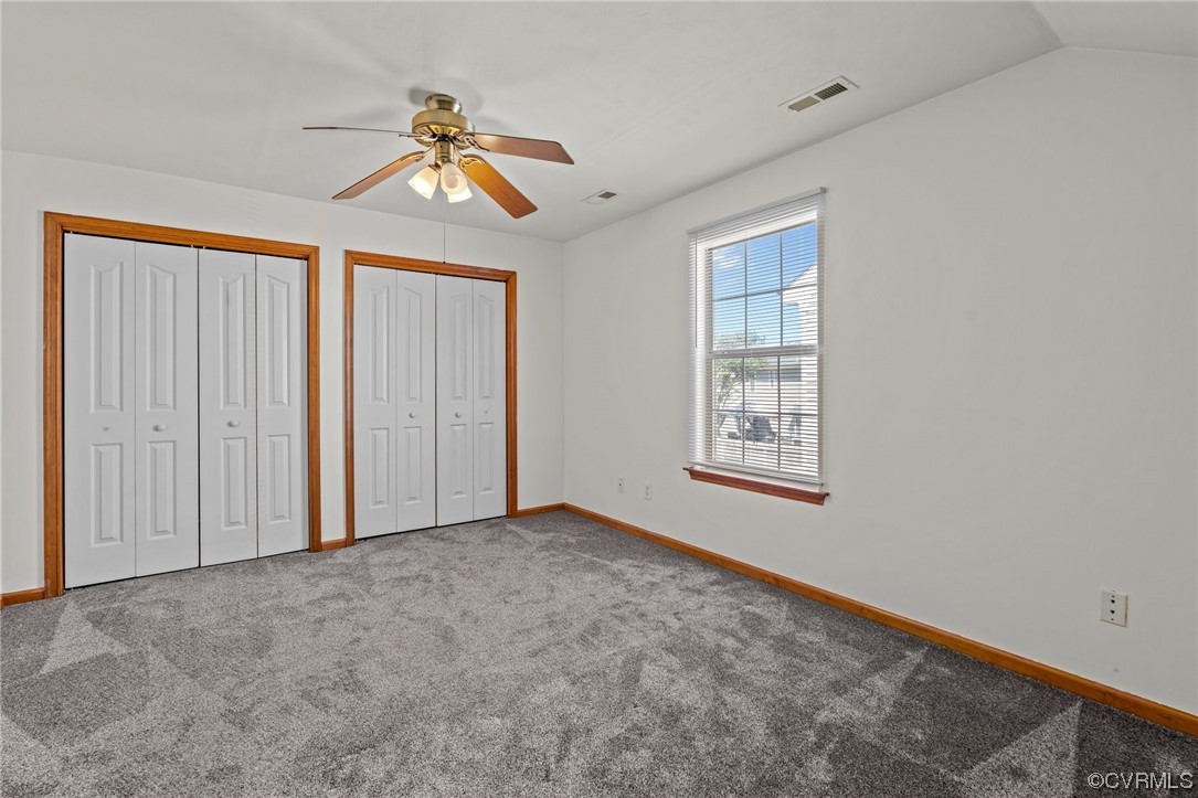131 Stoney Ridge Avenue, Unit 52 Suffolk, VA 23435 - Photo 27 of 36 a view of an empty room with a window