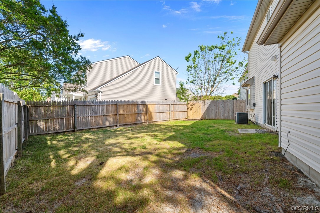 131 Stoney Ridge Avenue, Unit 52 Suffolk, VA 23435 - Photo 32 of 36 a view of a backyard
