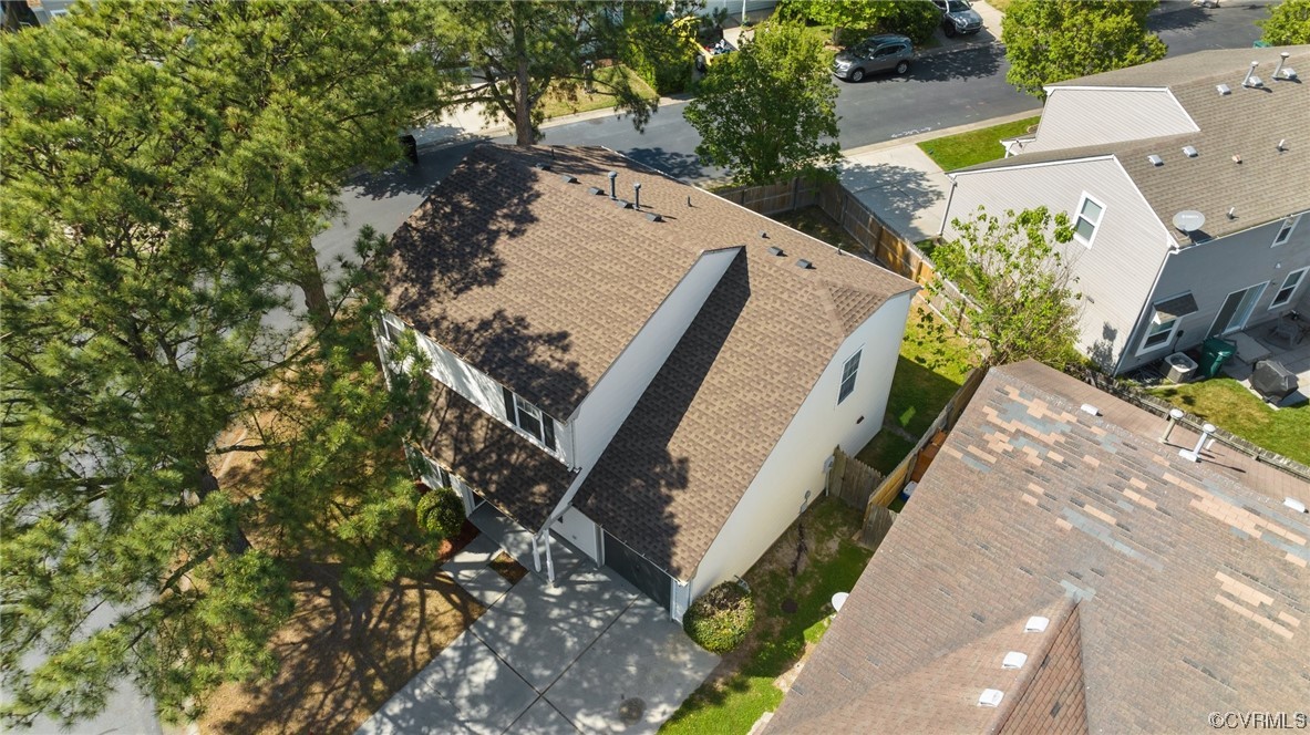 131 Stoney Ridge Avenue, Unit 52 Suffolk, VA 23435 - Photo 33 of 36 a view of a yard with plants