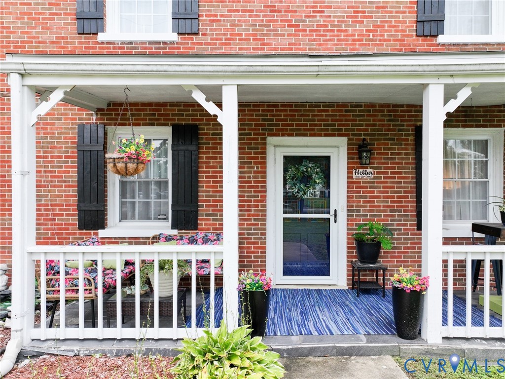 111 Whiteside Road Sandston, VA 23150 - Photo 41 of 45 Brick exterior, white window trim, black louvered