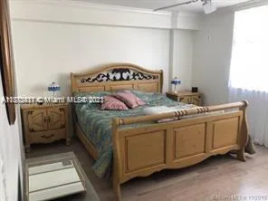 a bedroom with a bed in it