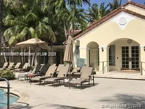 a view of a house with sitting area and furniture