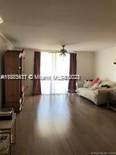 3606 South Ocean Boulevard, Unit 504 Highland Beach, FL 33487 - Photo 3 of 26 a hallway with a view of living room with furniture and windows
