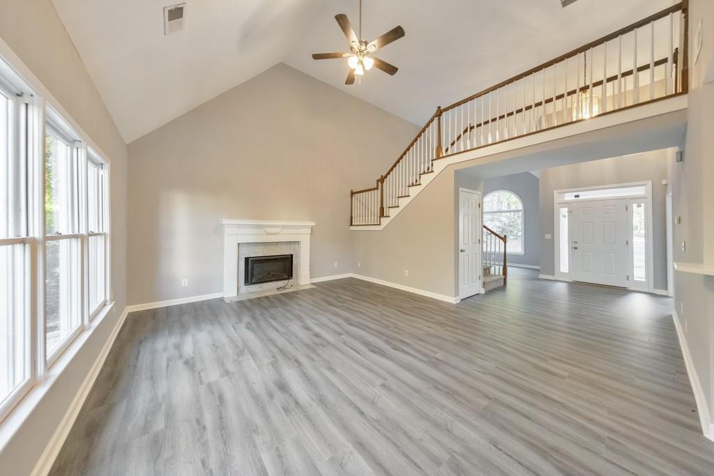 4804 Thicket Path Northwest Acworth, GA 30102 - Photo 13 of 48 a view of empty room with wooden floor and fan