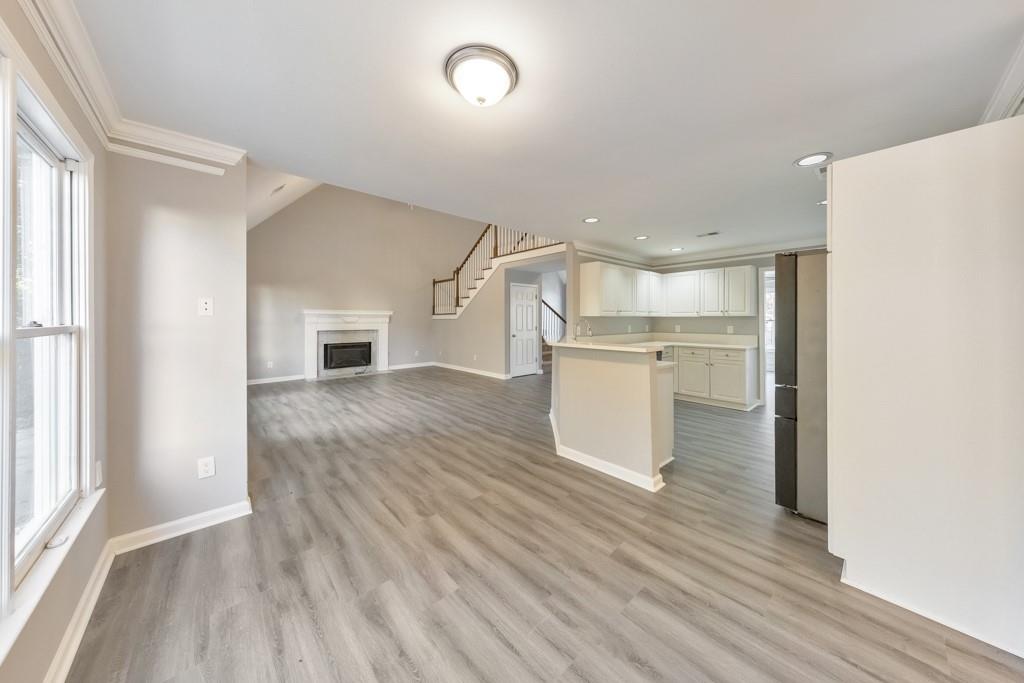 4804 Thicket Path Northwest Acworth, GA 30102 - Photo 15 of 48 a view of a kitchen with wooden floor and a kitchen