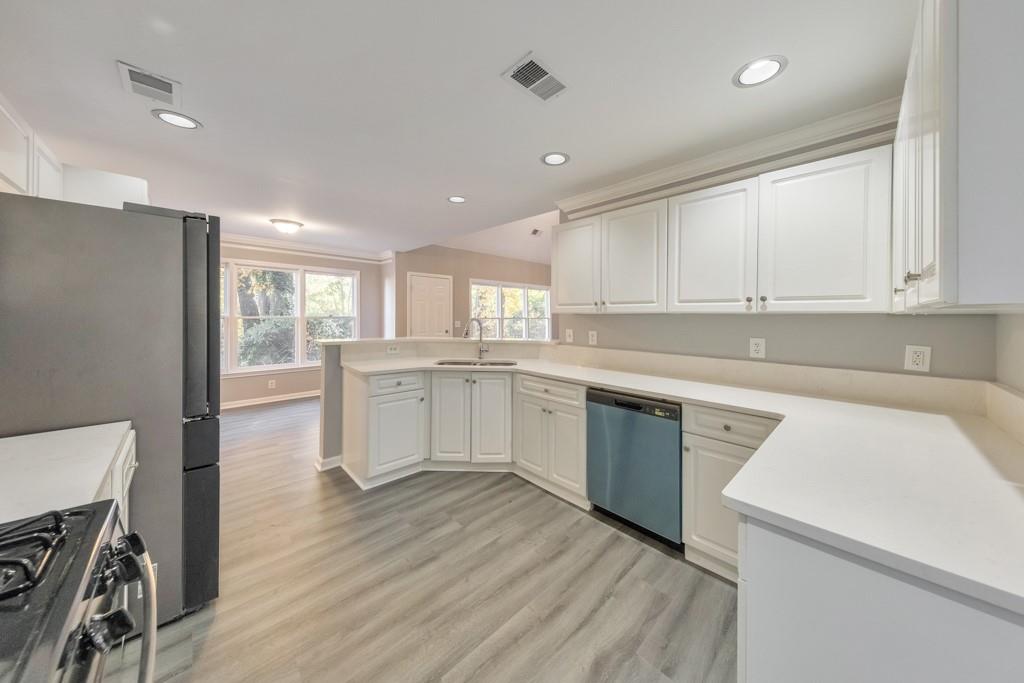 4804 Thicket Path Northwest Acworth, GA 30102 - Photo 17 of 48 a kitchen with a sink window and cabinets