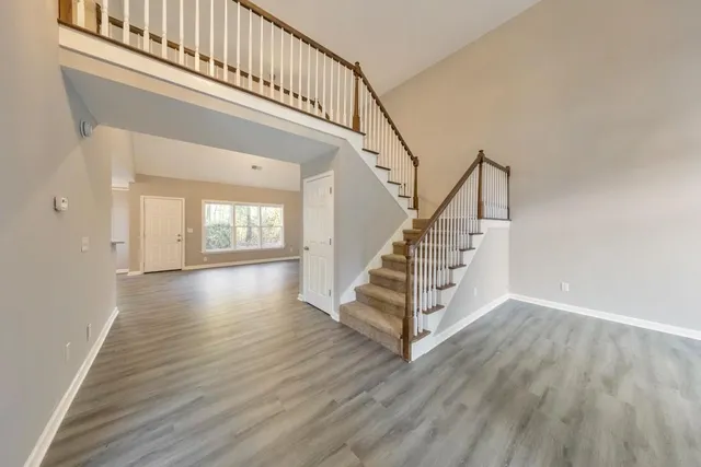 a view of entryway with wooden floor