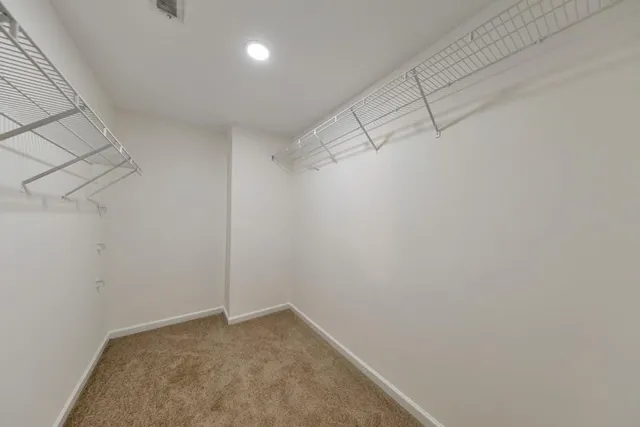 a view of a room with racks on the wall