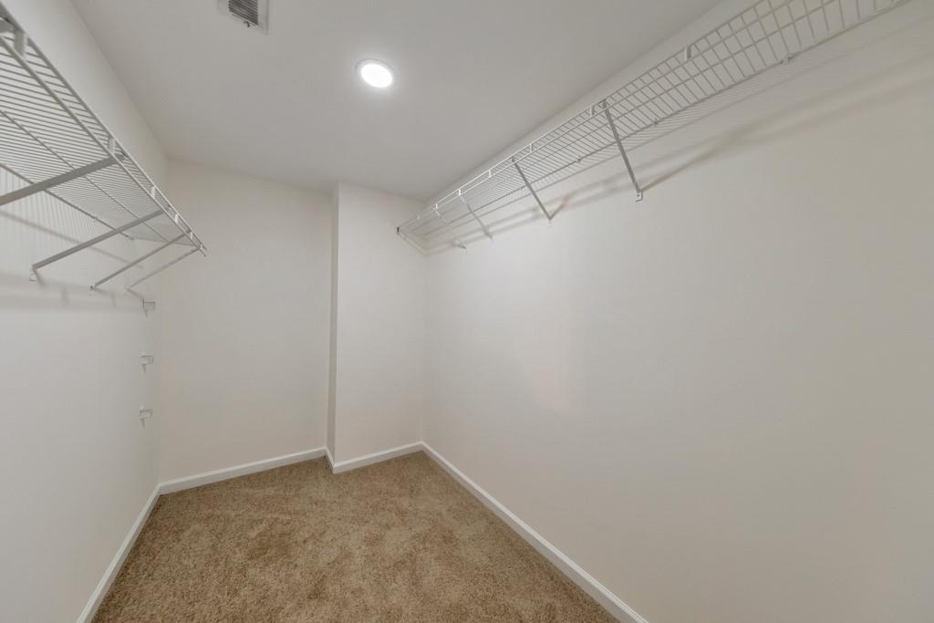 4804 Thicket Path Northwest Acworth, GA 30102 - Photo 29 of 48 a view of a room with racks on the wall