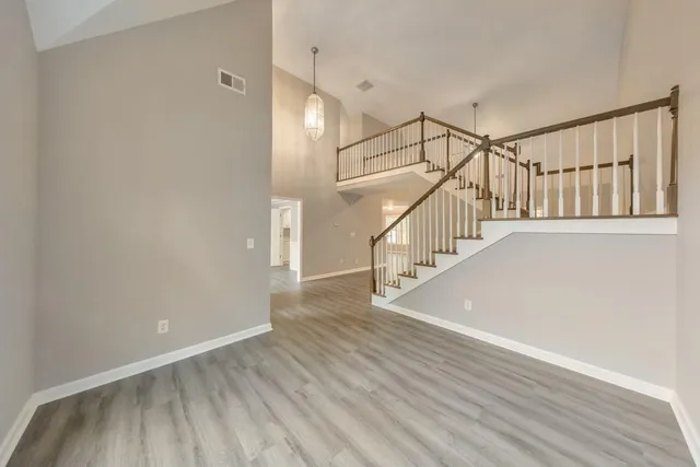 a view of entryway with wooden floor