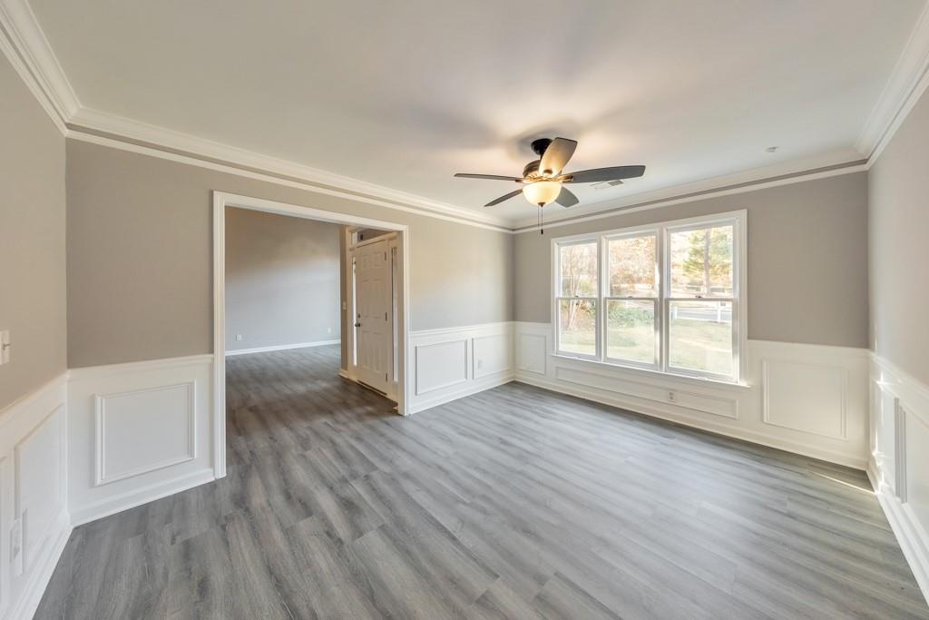 4804 Thicket Path Northwest Acworth, GA 30102 - Photo 8 of 48 an empty room with wooden floor and windows
