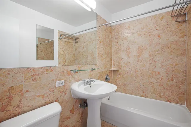 a bathroom with a sink and a bathtub