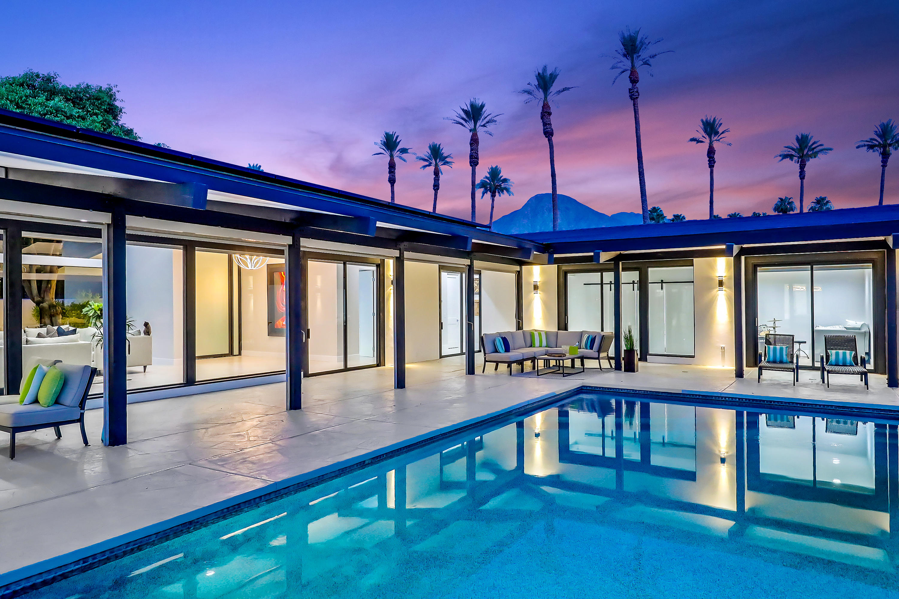 45731 Paradise Valley Road Indian Wells, CA 92210 - Photo 2 of 41 a view of a living room and hall with wooden floor