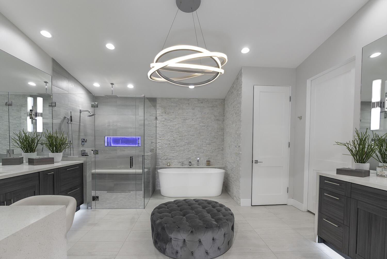 45731 Paradise Valley Road Indian Wells, CA 92210 - Photo 18 of 41 a spacious bathroom with a toilet a sink and a mirror