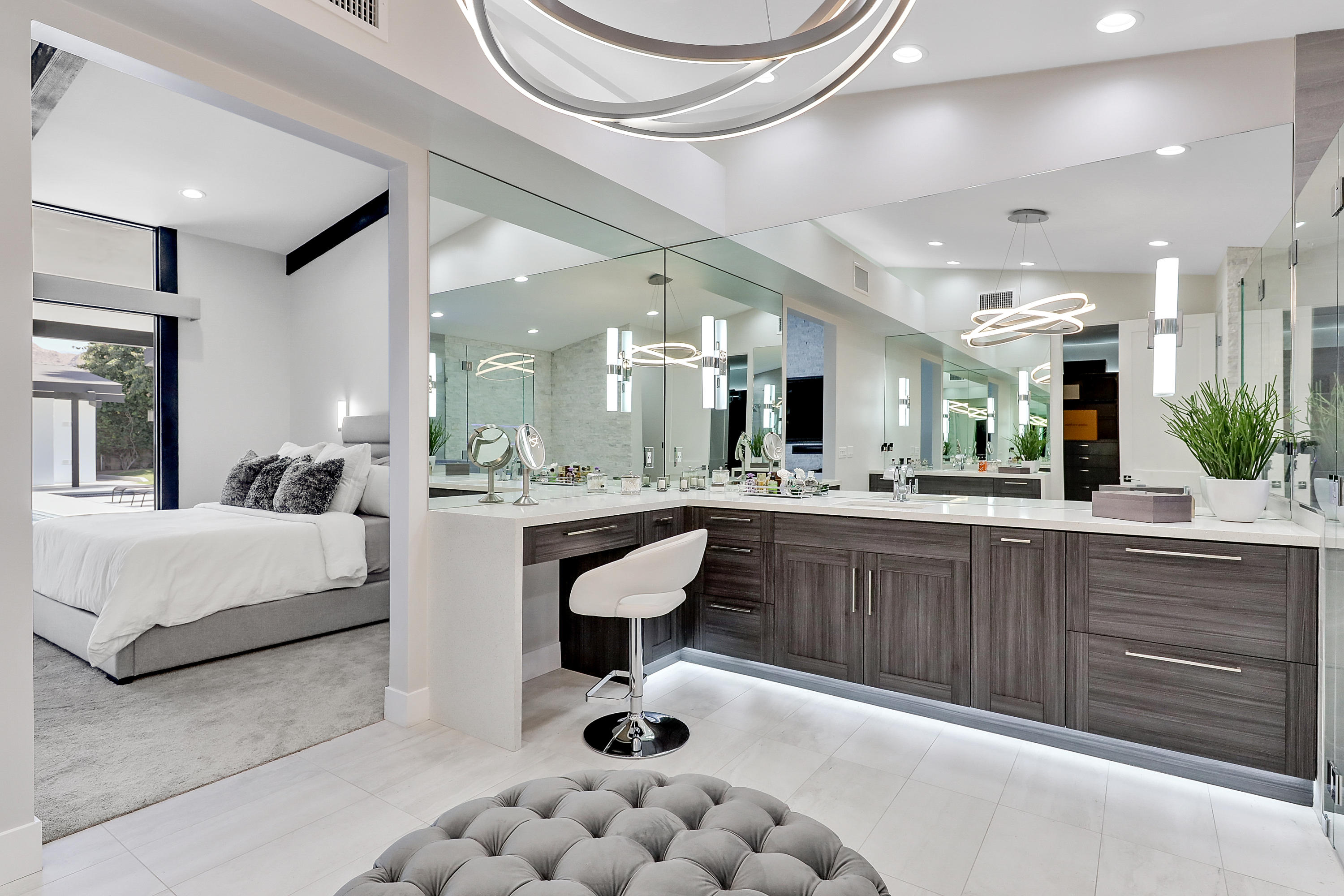 45731 Paradise Valley Road Indian Wells, CA 92210 - Photo 19 of 41 a large white kitchen with a large window and stainless steel appliances