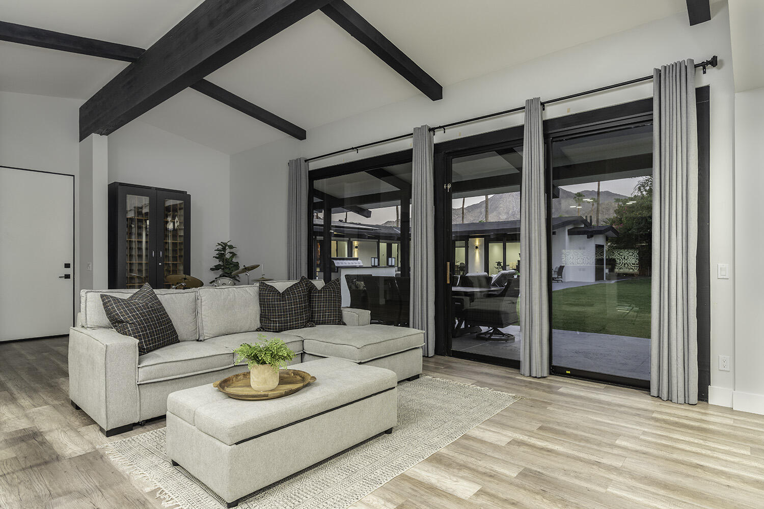 45731 Paradise Valley Road Indian Wells, CA 92210 - Photo 24 of 41 a living room with furniture and a large window