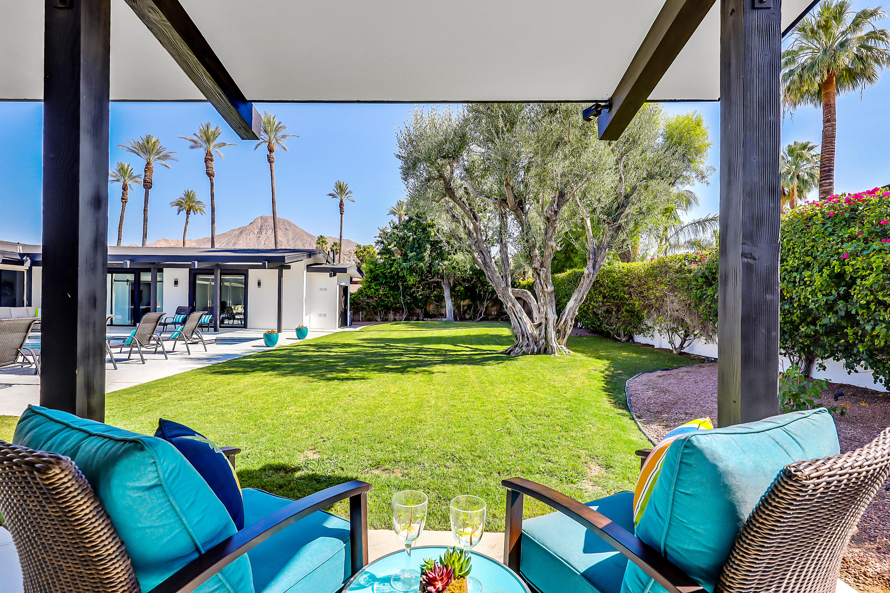 45731 Paradise Valley Road Indian Wells, CA 92210 - Photo 29 of 41 a view of a swimming pool with a patio