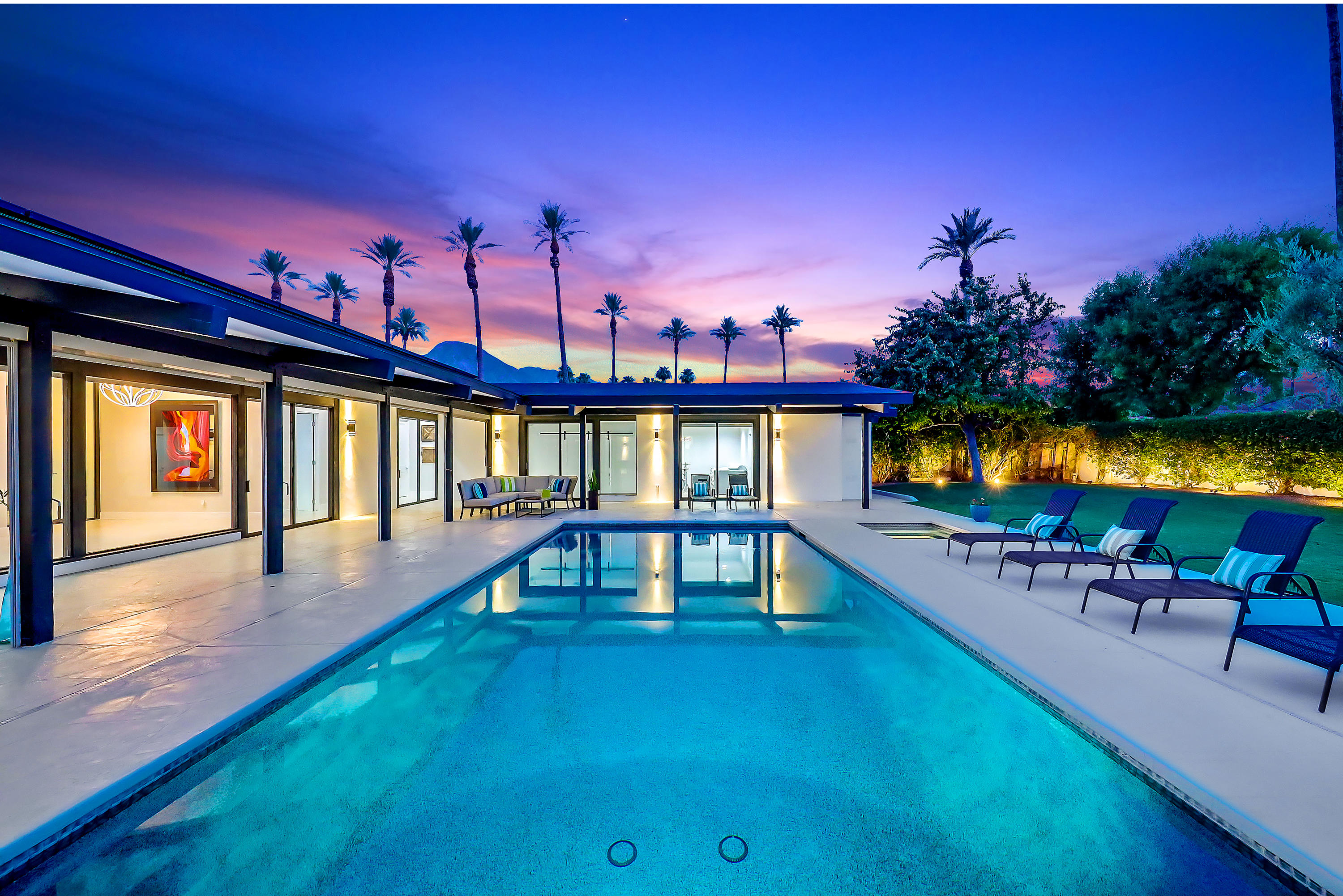 45731 Paradise Valley Road Indian Wells, CA 92210 - Photo 31 of 41 a view of a house with a swimming pool