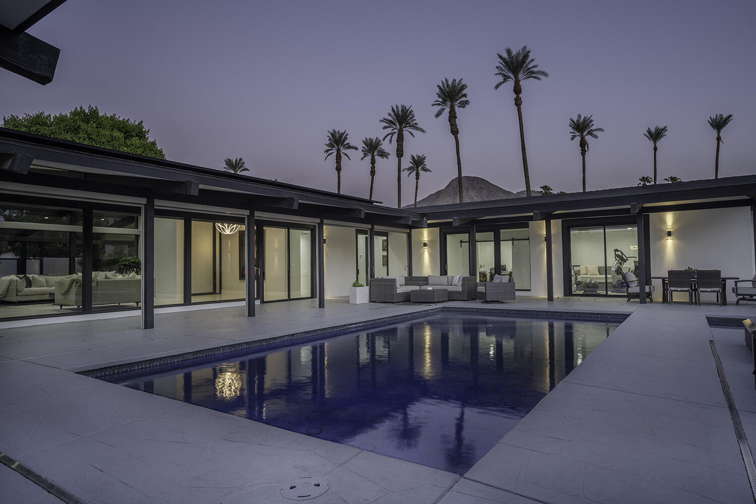 45731 Paradise Valley Road Indian Wells, CA 92210 - Photo 39 of 41 a view of a swimming pool with seating space