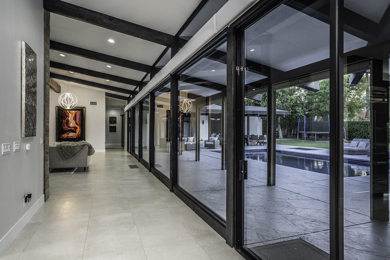 45731 Paradise Valley Road Indian Wells, CA 92210 - Photo 8 of 41 a view of a hallway with an entryway and livingroom view