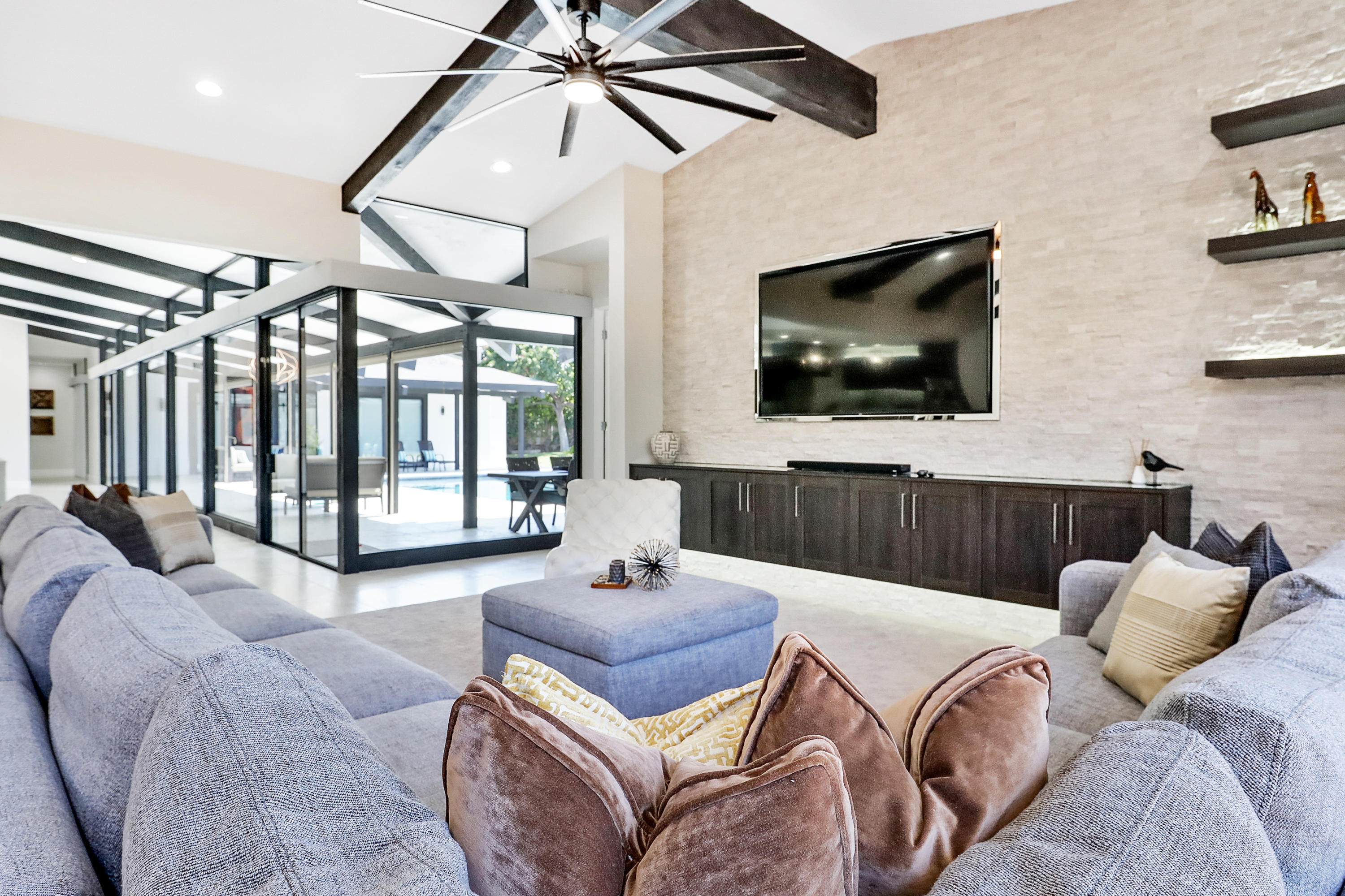 45731 Paradise Valley Road Indian Wells, CA 92210 - Photo 9 of 41 a living room with furniture and a flat screen tv