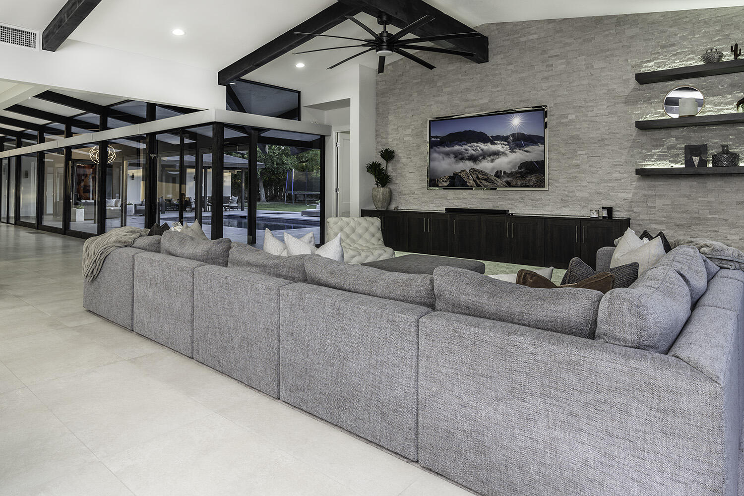 45731 Paradise Valley Road Indian Wells, CA 92210 - Photo 10 of 41 a living room with furniture and a flat screen tv