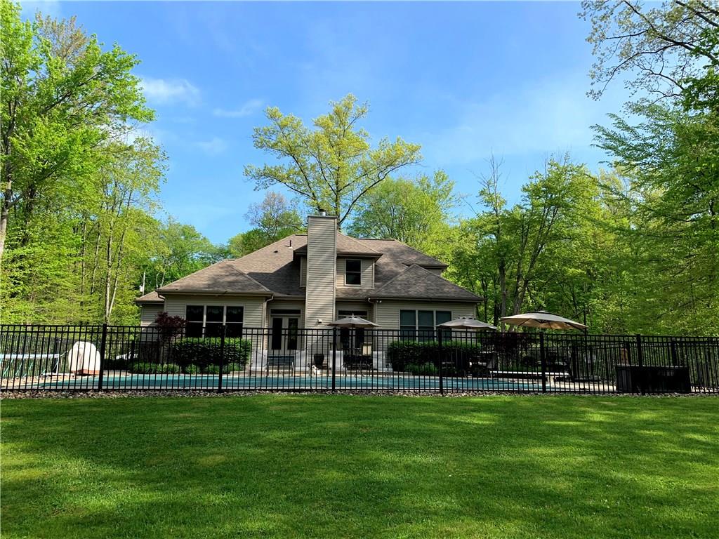 580 George Jr Road Grove City, PA 16127 - Photo 2 of 25 Heated in ground pool with stately wrought iron fence