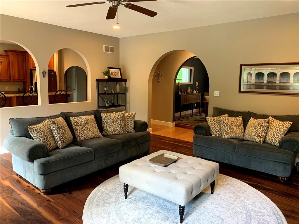 580 George Jr Road Grove City, PA 16127 - Photo 7 of 25 Large living room with walnut hardwood floors