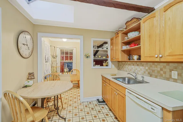 a kitchen with stainless steel appliances granite countertop a sink and cabinets