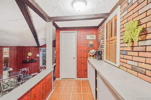 workspace with wooden floor and furniture