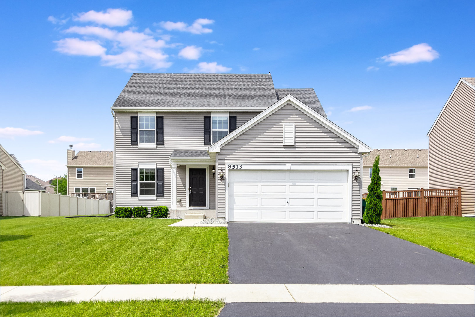 8513 Buckingham Road Joliet, IL 60431 - Photo 1 of 25 a view of a house with a yard