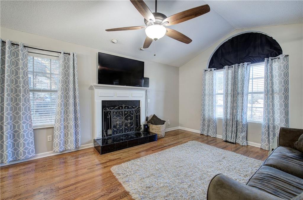 19 Canefield Drive Cartersville, GA 30120 - Photo 13 of 28 a living room with furniture and a fireplace