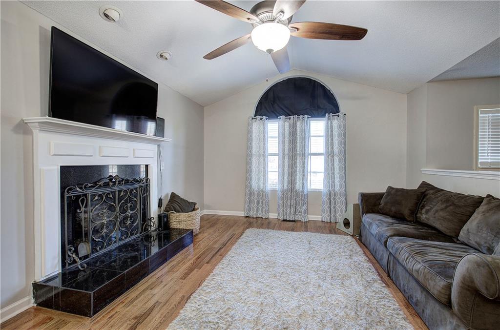 19 Canefield Drive Cartersville, GA 30120 - Photo 14 of 28 a living room with furniture and a fireplace