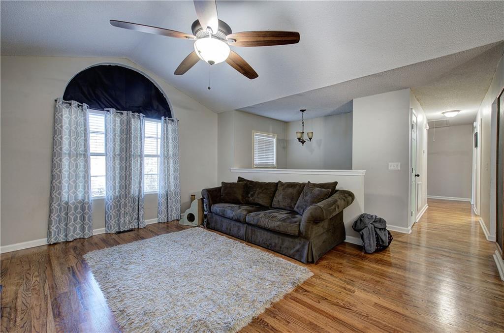 19 Canefield Drive Cartersville, GA 30120 - Photo 15 of 28 a living room with furniture and a ceiling fan