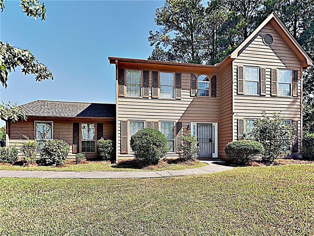 2040 Enon Mill Drive Southwest Atlanta, GA 30331 - Photo 1 of 1 a front view of a house
