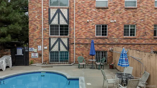 a front view of a house with seating space