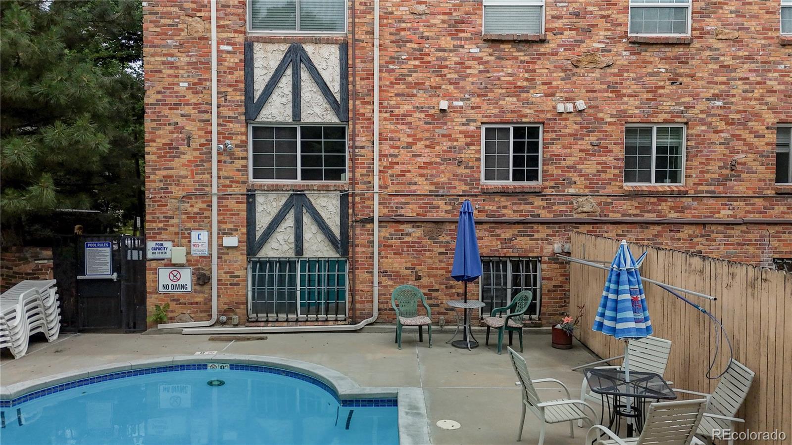 1350 Josephine Street, Unit 101A Denver, CO 80206 - Photo 23 of 36 a front view of a house with seating space