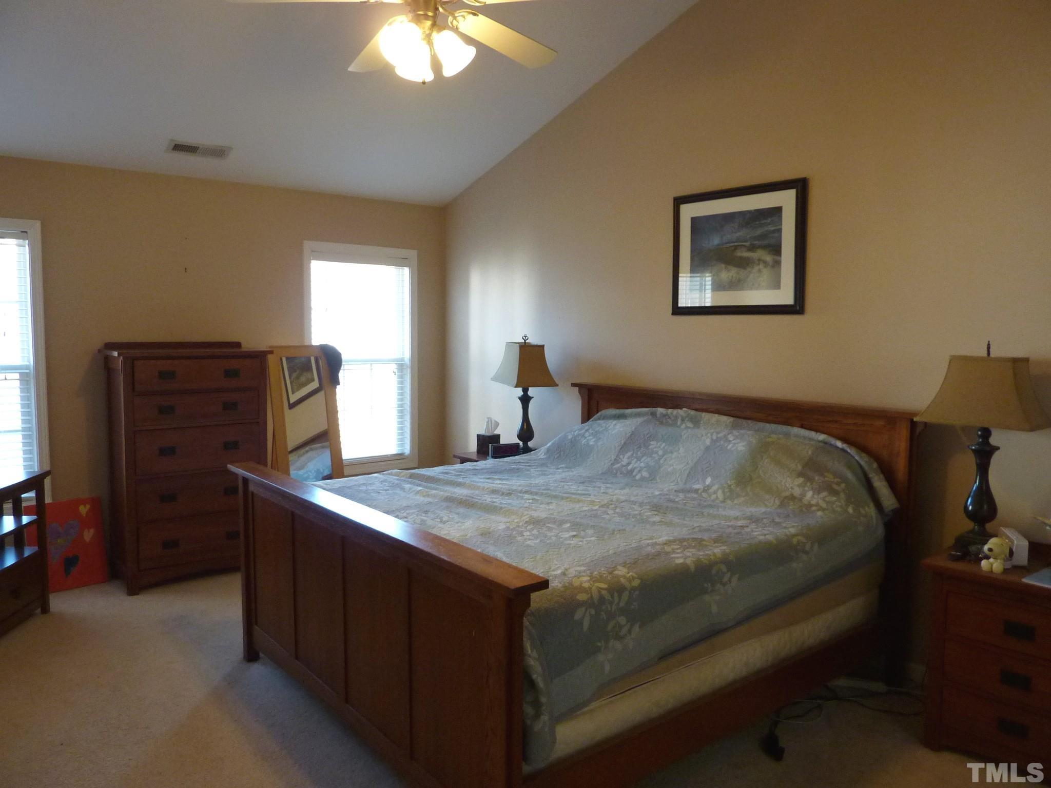 5943 Brambleberry Way Raleigh, NC 27616 - Photo 4 of 12 Master suite complete with private bathroom and huge walk in closet! Garden tub & separate shower, water closet, dual vanity!