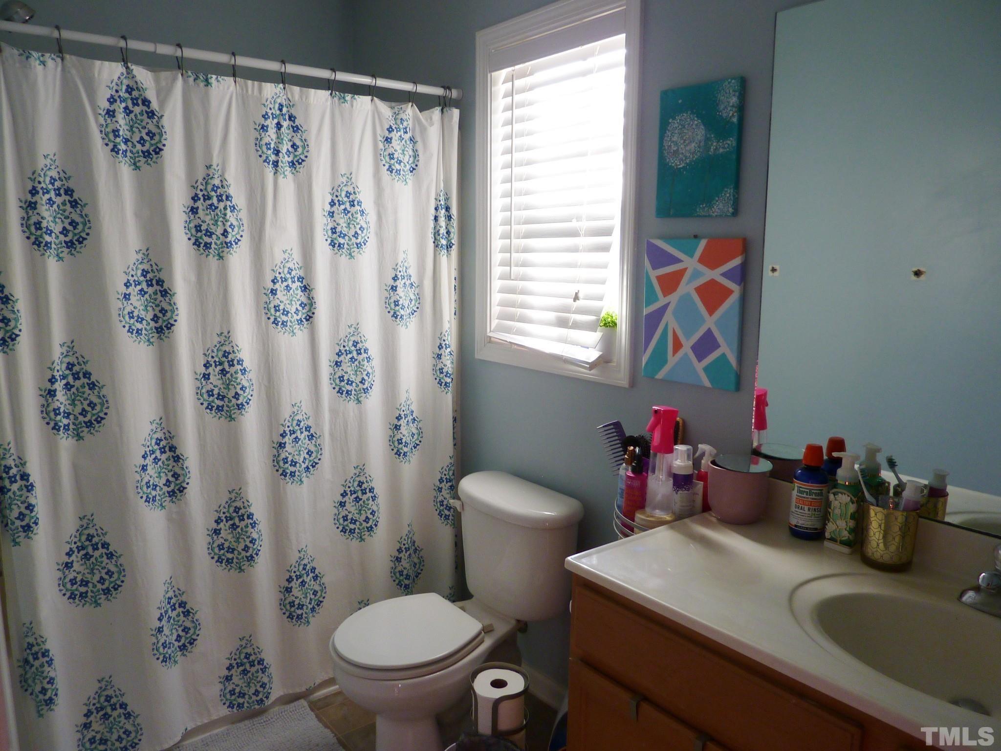 5943 Brambleberry Way Raleigh, NC 27616 - Photo 7 of 12 Full bath on second level.