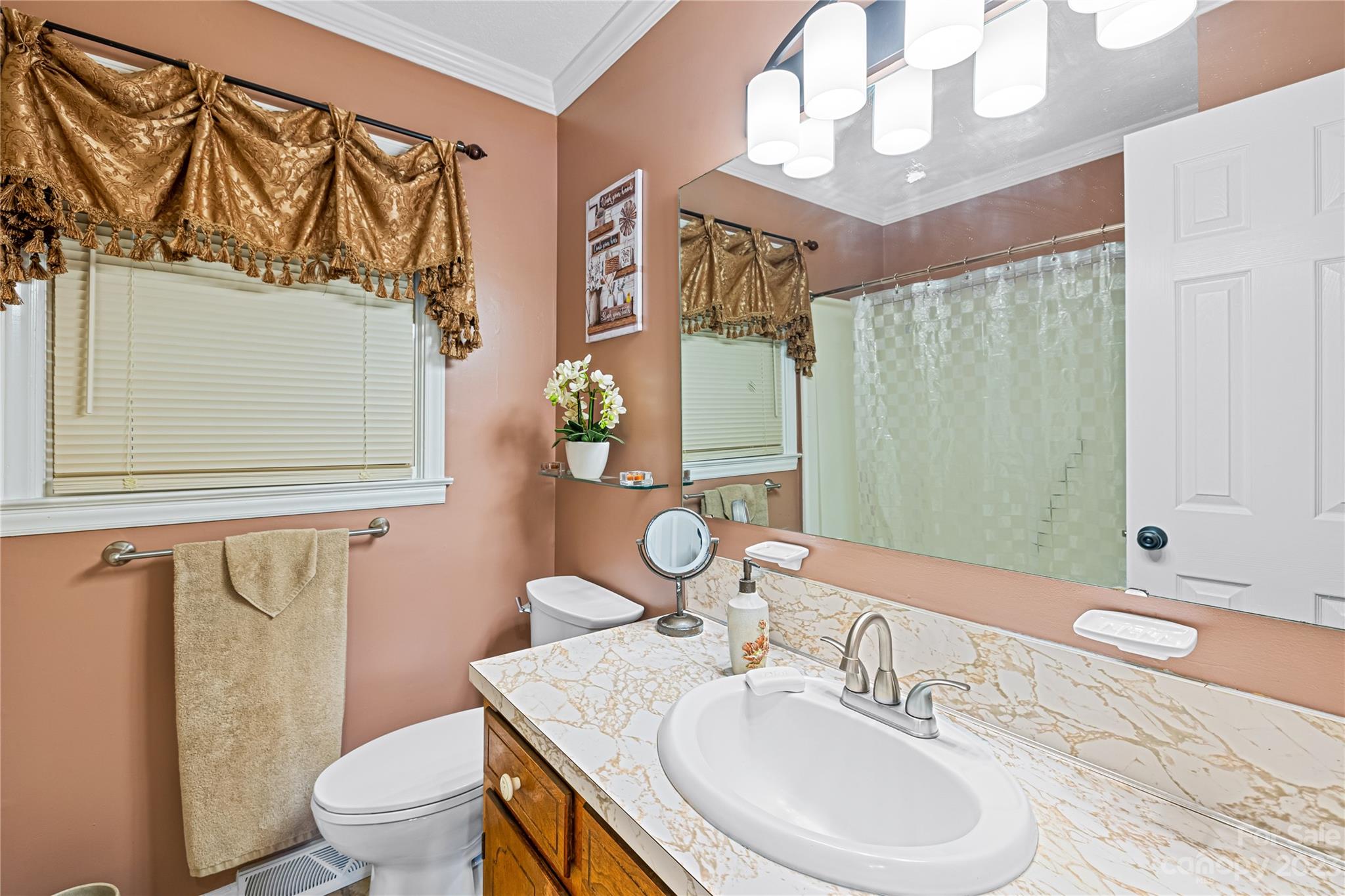 137 Brook Road Kings Mountain, NC 28086 - Photo 11 of 46 a bathroom with a sink vanity mirror and toilet