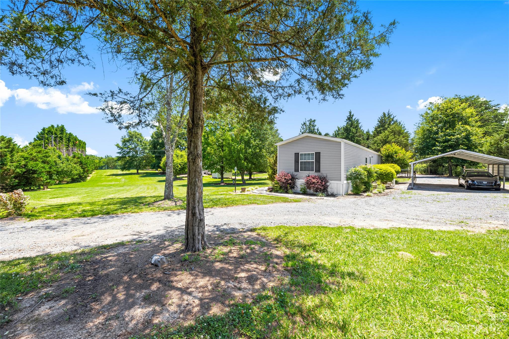 137 Brook Road Kings Mountain, NC 28086 - Photo 20 of 46 a front view of a house with a yard