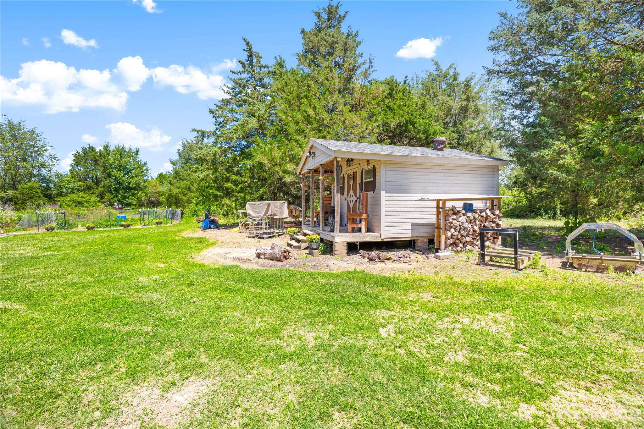 137 Brook Road Kings Mountain, NC 28086 - Photo 35 of 46 a view of a house with backyard porch and sitting area