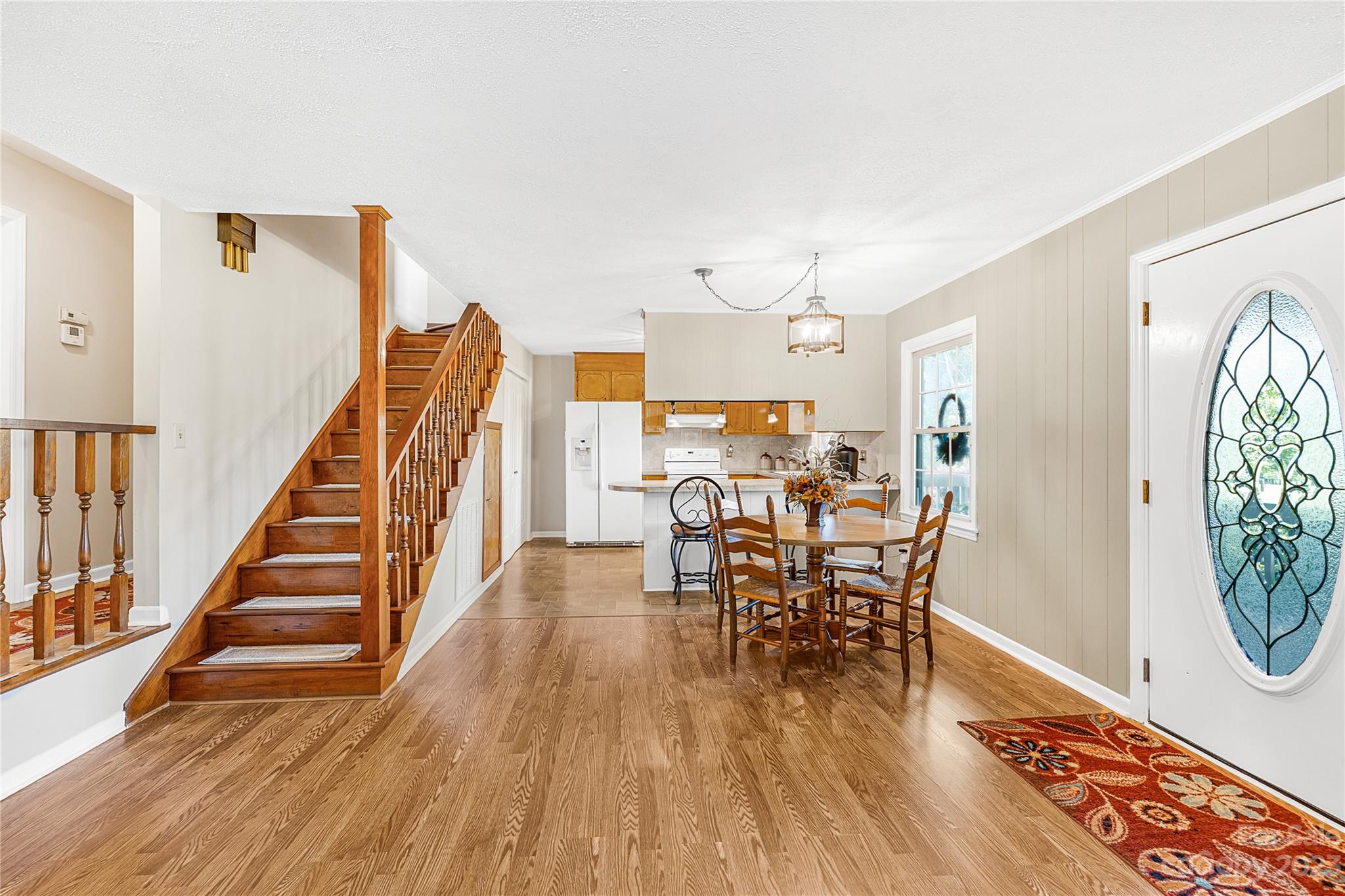 137 Brook Road Kings Mountain, NC 28086 - Photo 5 of 46 a view of a dining room with furniture and wooden floor