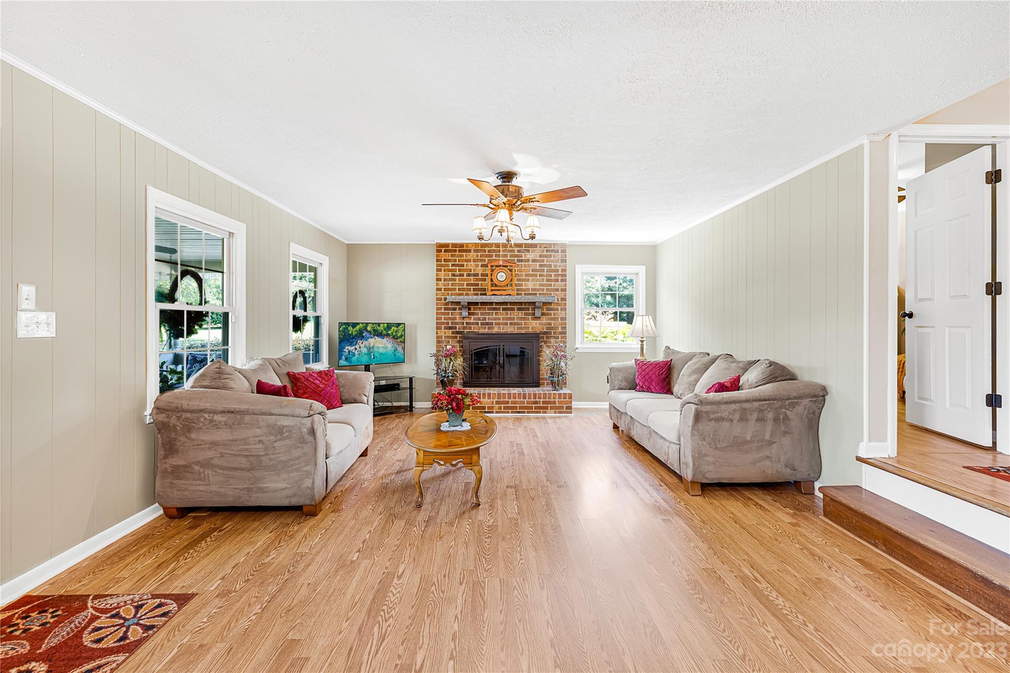 137 Brook Road Kings Mountain, NC 28086 - Photo 7 of 46 a living room with furniture and a fireplace