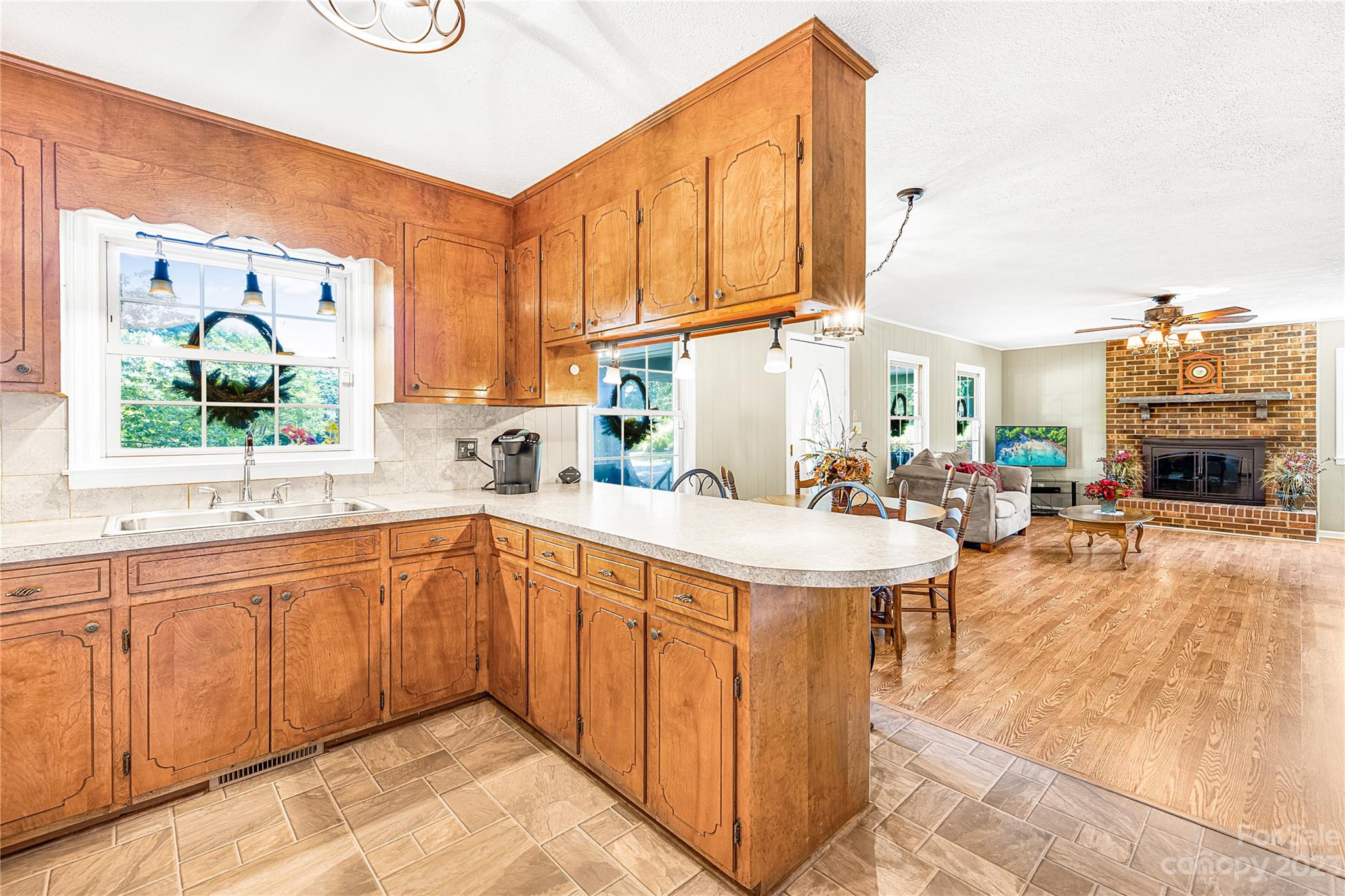 137 Brook Road Kings Mountain, NC 28086 - Photo 8 of 46 a large white kitchen with a large window